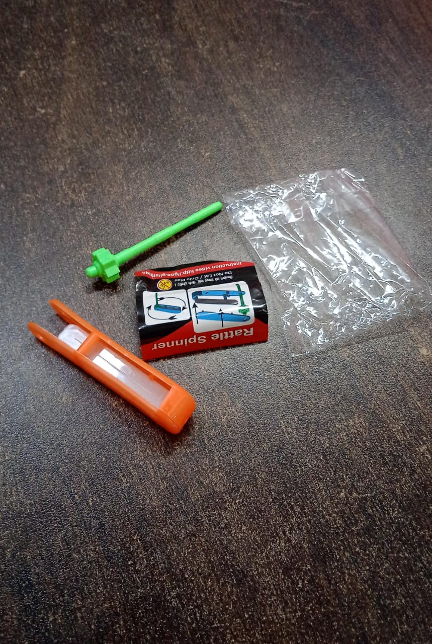 Small Colourful Non-Toxic Plastic Rattle Spinner Toys for Babies, Kids (1 Pc / Mix Color & Design) Your Brand