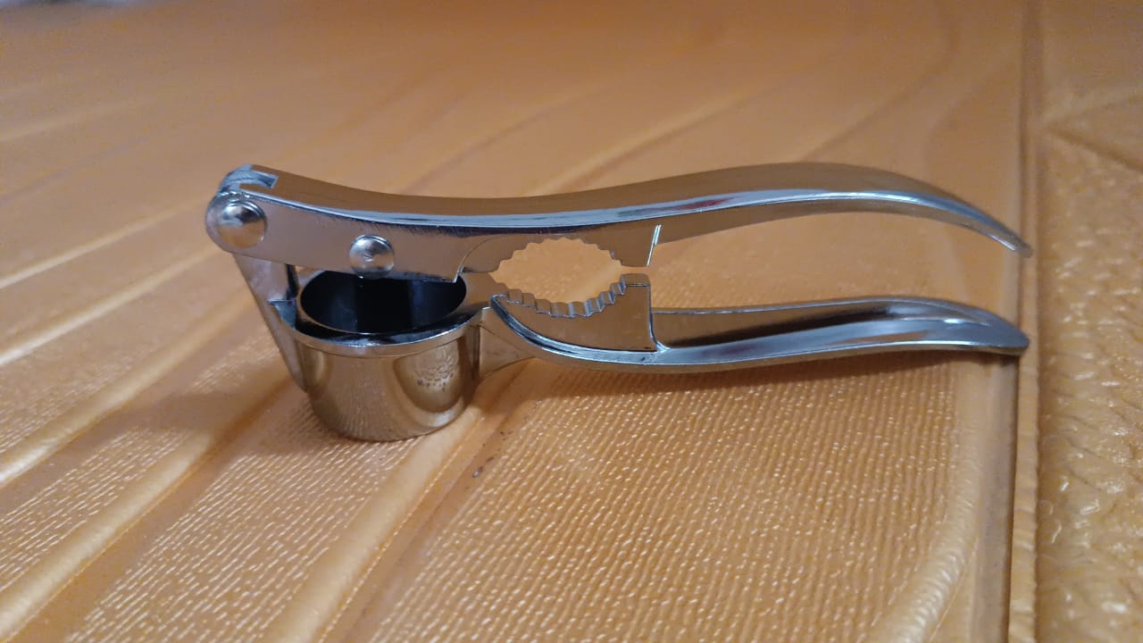 2 in1 Garlic Masher Premium Garlic Press & Walnut Cracker Opener (1 Pc) Your Brand