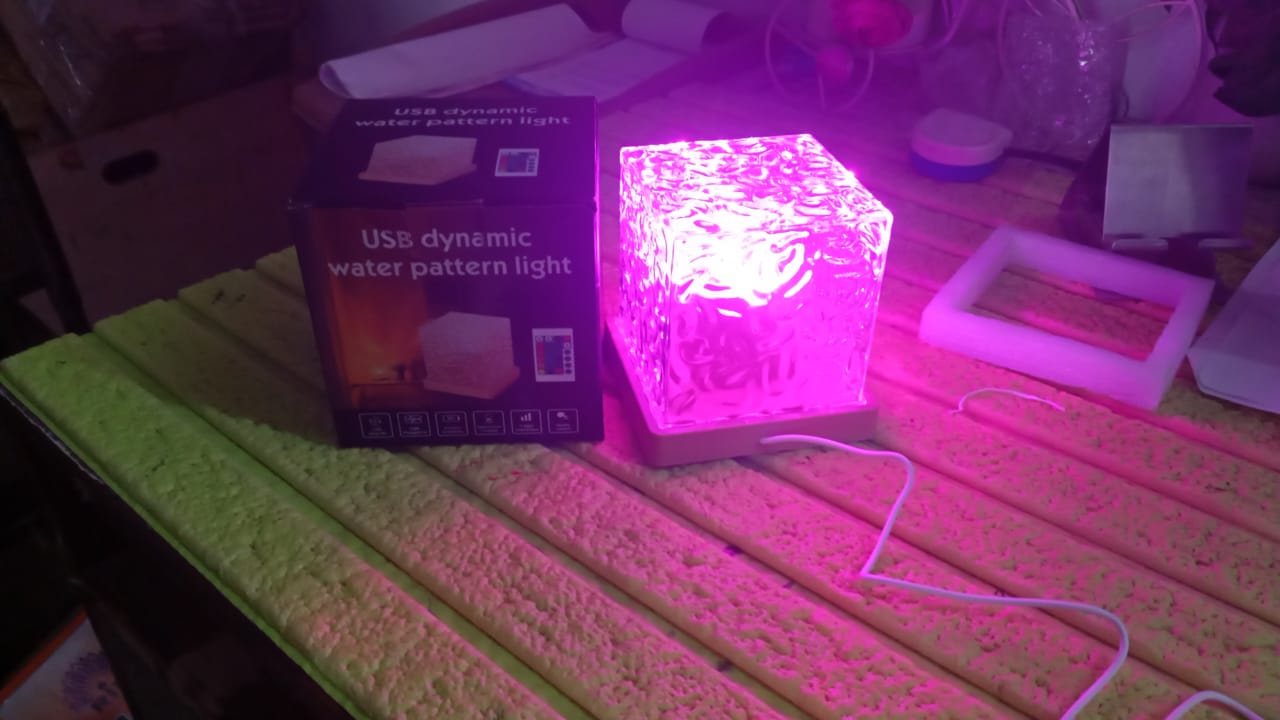 Dynamic Rotating Water Ripple Night Lamp With Remote Your Brand