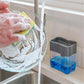 Compact liquid soap dispenser with integrated sponge holder
